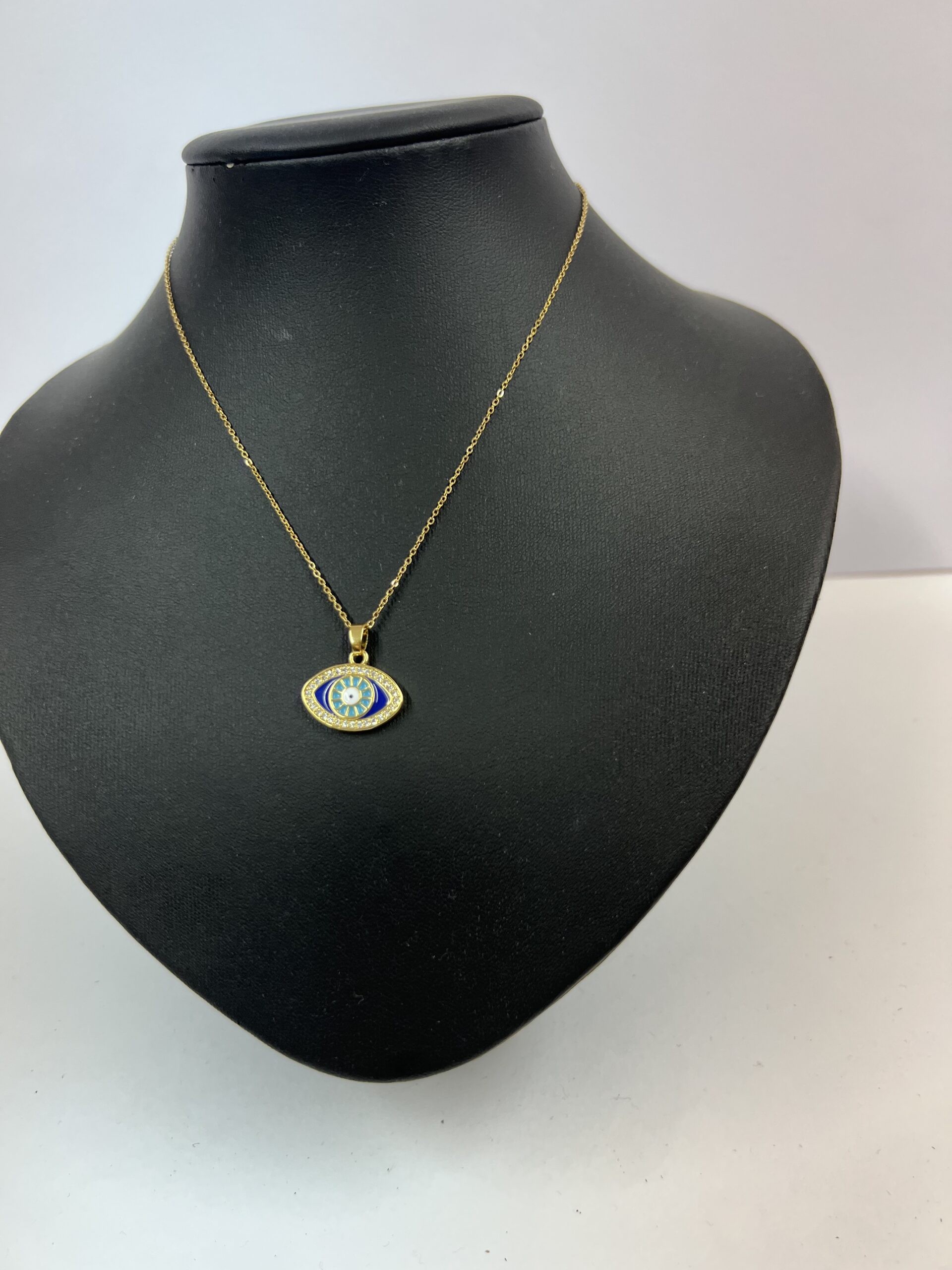 Kολιέ με σχέδιο μάτι και διαμαντάκια.